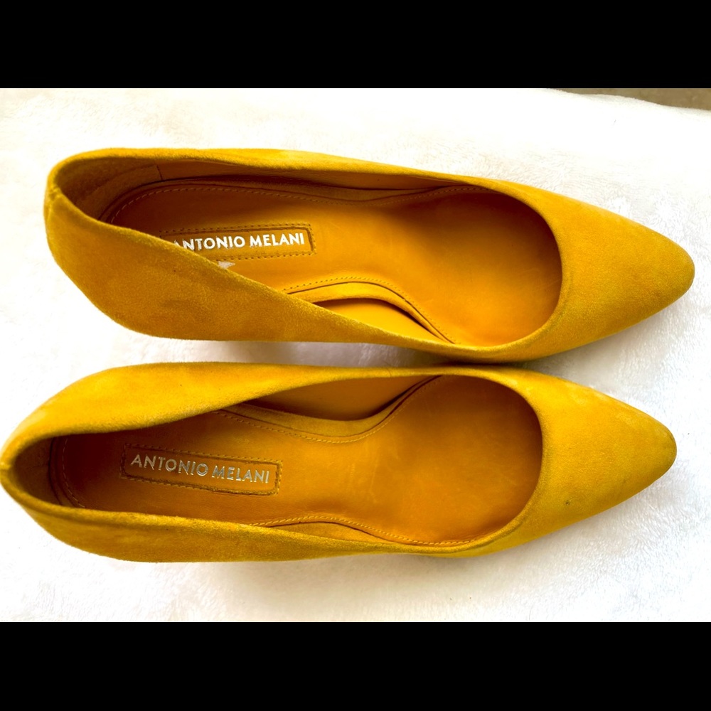 Antonia Melani bright yellow high heel shoe.